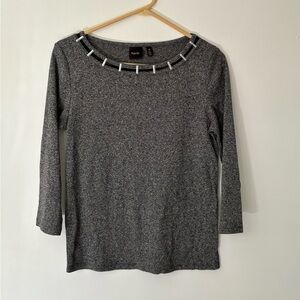 Like new grey sweater with metal neck detail and 3/4 sleeves. Size medium